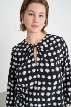 Blusa con apertura a goccia - Nero Bianco
