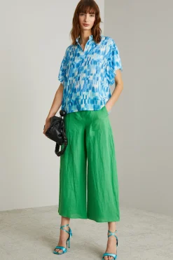 Blusa con chiusura a polo - Turchese