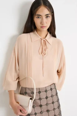 Blusa con maniche a sbuffo - Beige