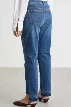 Jeans con fondo irregolare a taglio vivo - Blu