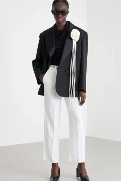 Pantalone con applicazione floreale - Bianco