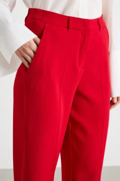 Pantalone con applicazione floreale - Rosso