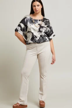 Pantaloni a zampa - Bianco