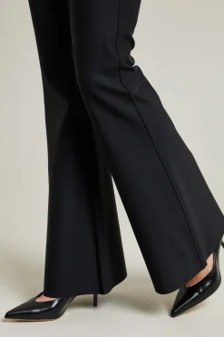 Pantaloni flare in jersey tecnico - Nero