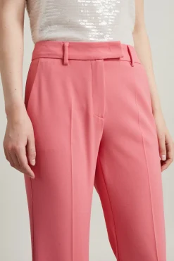 Pantaloni flare in tela stretch - Rosa Scuro