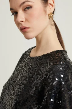 Top corto con paillettes - Nero