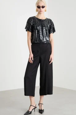 Top crop con paillettes - Nero