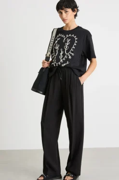 T-shirt con motivo stampato - Nero Bianco
